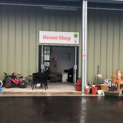 A bright and welcoming reuse shop at Thorn Turn, featuring various second-hand items neatly displayed for purchase. The shop is part of Central Bedfordshire's recycling initiative, promoting the reuse of goods in good condition.