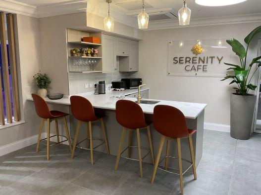 Cafe area showing breakfast stools and servery