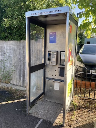 A phone box marked for removal by BT