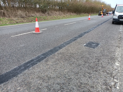 Pothole filled with rubber-modified stone-mastic asphalt