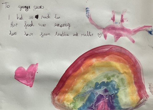 Thank you note that reads: "To young carers. I had so much fun. The food was amazing. Lots of love from Amellia and Mollie."